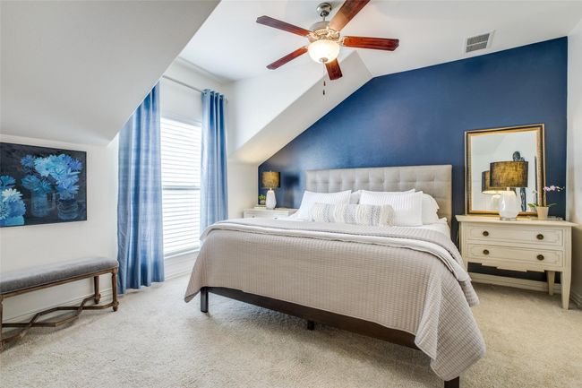 Bedroom featuring carpet, lofted ceiling, and ceiling fan | Image 15