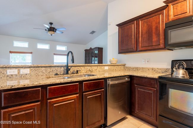 kitchen looking at living room | Image 16