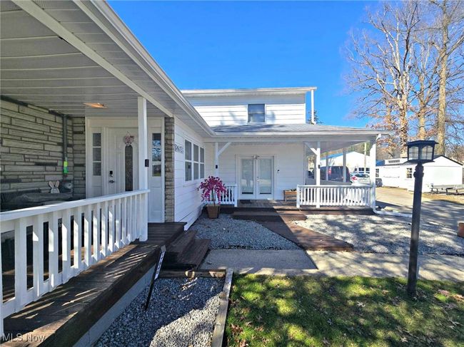 View of patio / terrace featuring a porch and french doors | Image 4