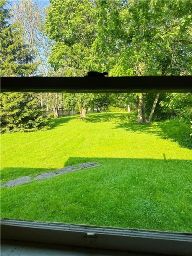 Unit 2 - View of the 330 foot deep backyard from the kitchen sink | Image 23