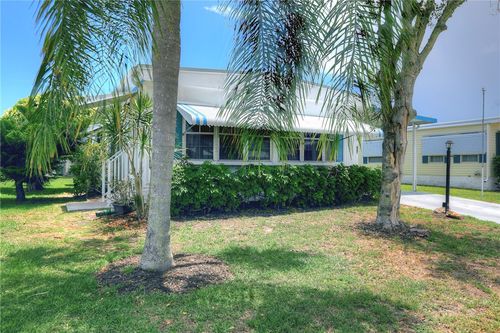827 Wren Cir, Barefoot Bay, FL, 32976-7506 | Card Image