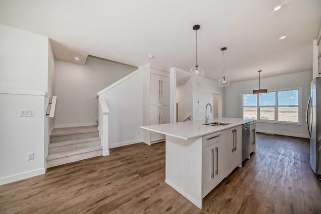 140 Merganser Drive W, Home with 3 bedrooms, 2 bathrooms and 2 parking in Chestermere AB | Image 9