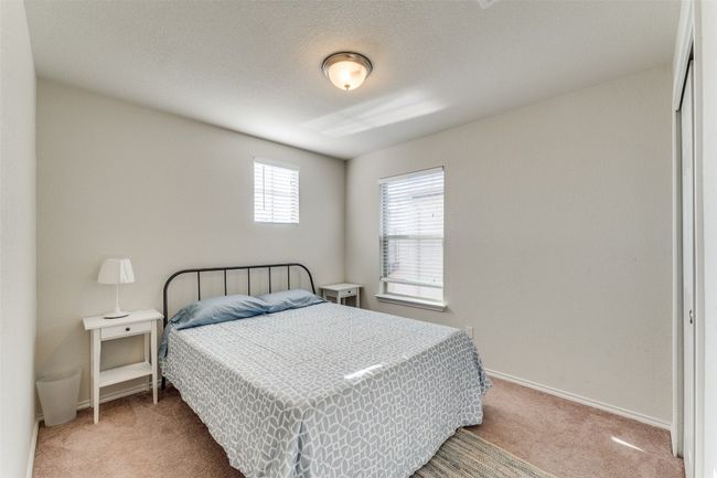 The second of two bedrooms with private closets on the second floor. | Image 20