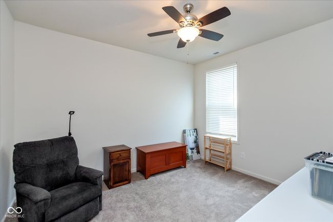 bedroom being utilized as an additional living area | Image 22