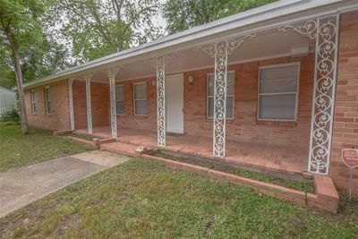 Fully bricked with wrought iron columns | Image 3