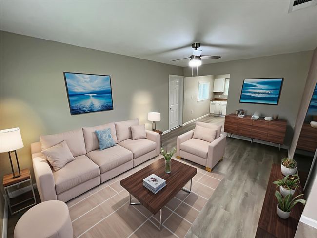 Living area featuring wood finished floors and a ceiling fan | Image 4