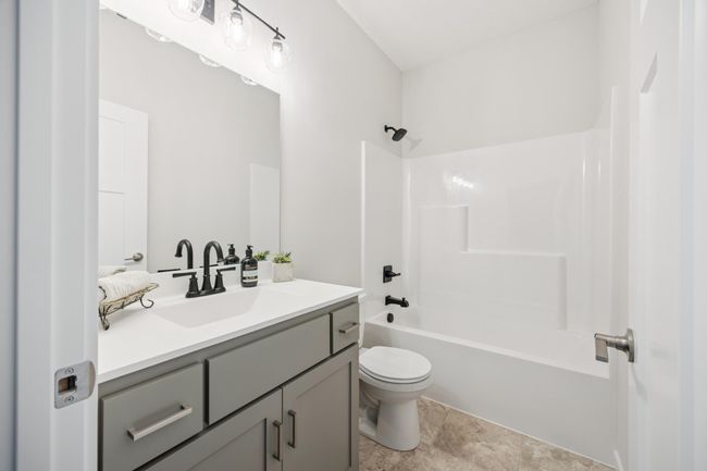 Upper level full bath with more marble countertops! | Image 19