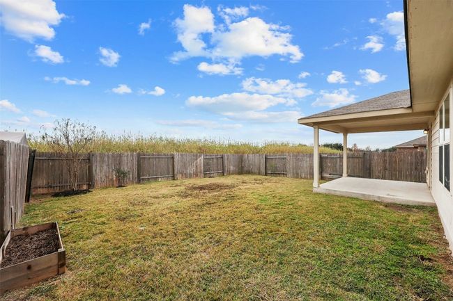 Spacious backyard with covered patio and no neighbors behind! | Image 28