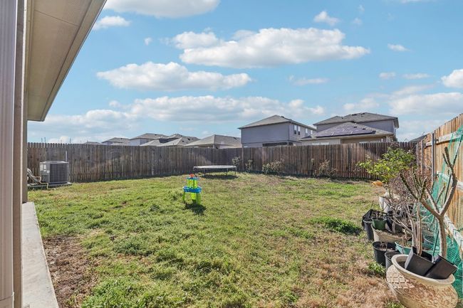 View of yard with central air condition unit and a fenced backyard | Image 21
