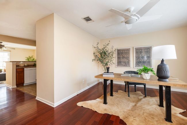Great light-filled rooms, wide hallway to kitchen and family room. | Image 5