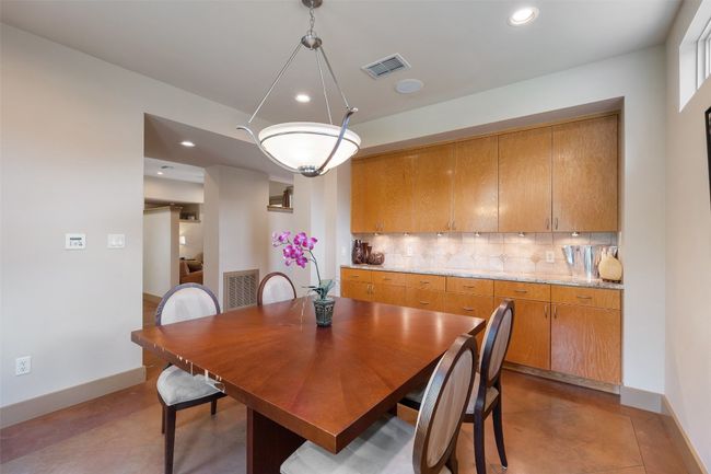 Dining room with baseboards and recessed lighting | Image 5