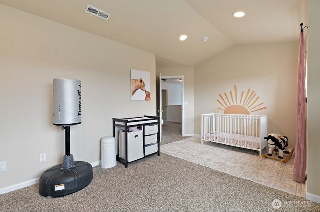 Each bedroom provides flexible space with room for desks, reading chairs, or creative studio use. | Image 16