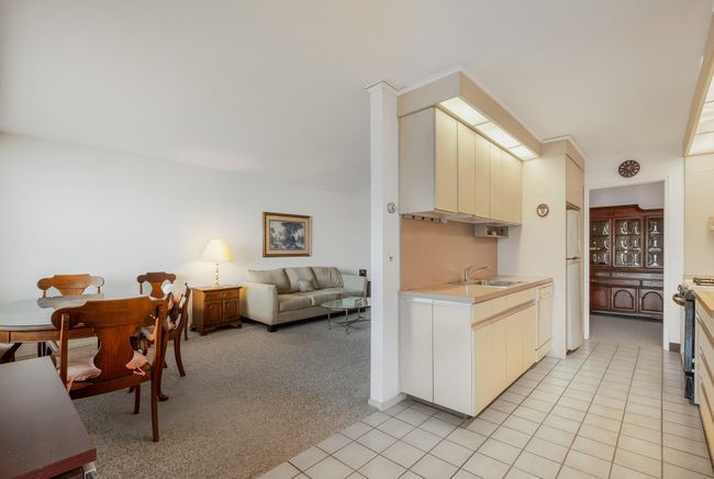 View of kitchen and living room from door to private terrace | Image 18
