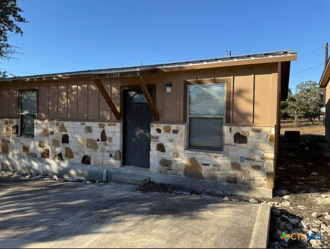 Each apartment has own entrance and back patio. Another view of apartment community. | Image 10