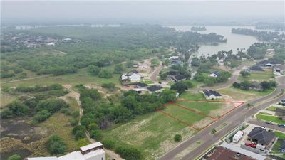 Bird's eye view featuring a water view | Image 2