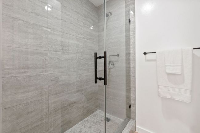 Bathroom featuring a shower stall | Image 26