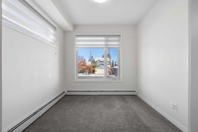 12 - 30 Shawnee Common Sw, Condo with 2 bedrooms, 3 bathrooms and 1 parking in Calgary AB | Image 18