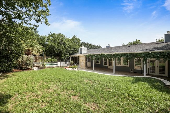 View of yard featuring french doors and a patio area | Image 14