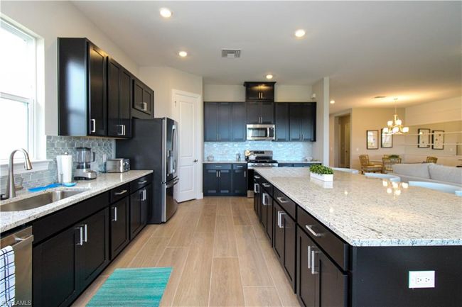 15765 Cortina St, House other with 4 bedrooms, 3 bathrooms and null parking in Naples FL | Image 31
