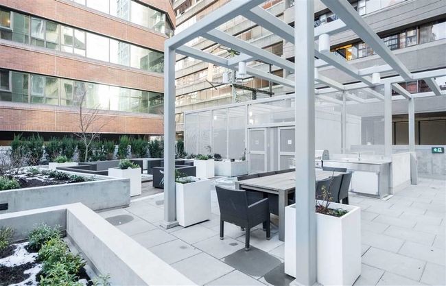 View of patio featuring outdoor lounge area, outdoor dining area, and area for grilling | Image 12