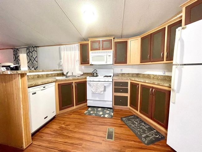 Spacious kitchen with breakfast bar | Image 9