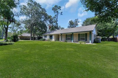 1011 Fairway Farms Lane, House other with 3 bedrooms, 2 bathrooms and null parking in Kingwood TX | Image 3