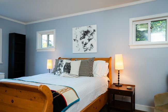Bedroom featuring baseboards and crown molding | Image 16