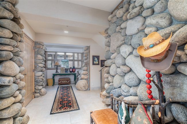 Hallway featuring light tile patterned floors | Image 5