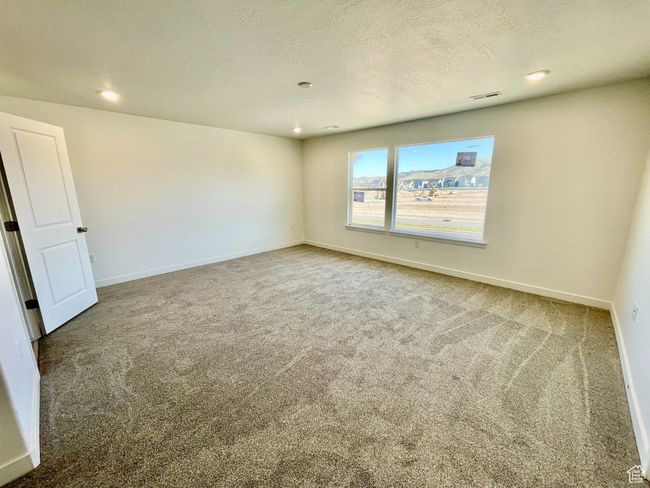 Spacious Primary Bedroom | Image 9