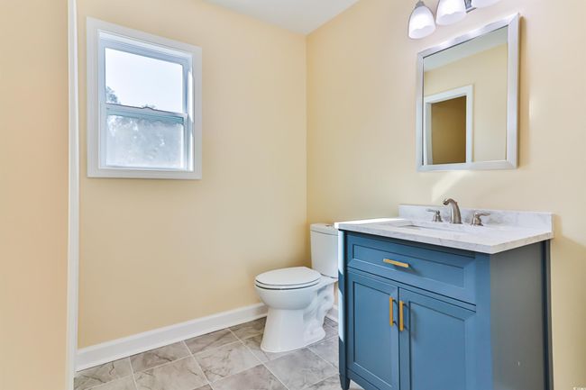 Bathroom with vanity and toilet | Image 16