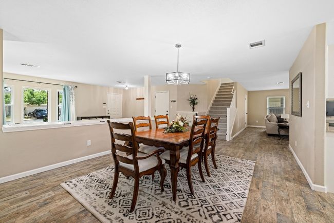 Fresh interior paint on the walls, trim, and doors adds a crisp, clean finish to this elegant space. | Image 15
