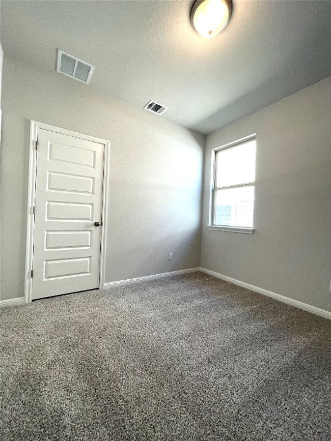 Empty room featuring carpet and baseboards | Image 18
