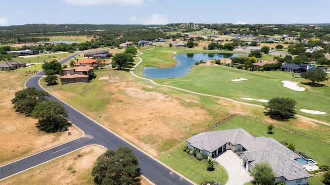 Aerial view of lot and nearby pond. | Image 27