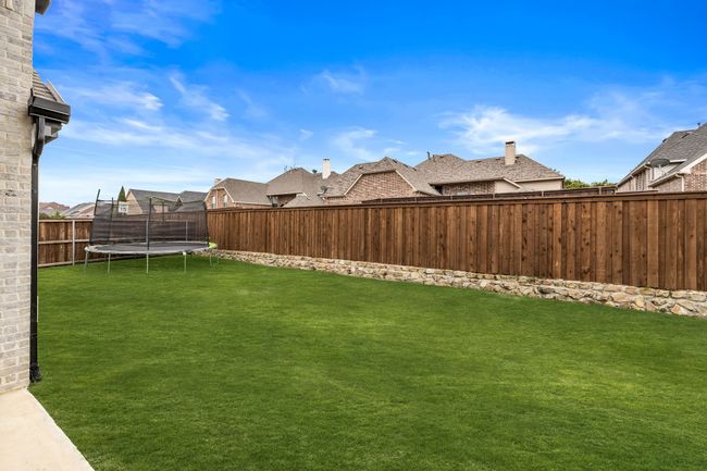View of yard featuring a trampoline | Image 39