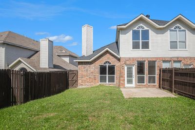 Back of property with a yard and a patio | Image 3