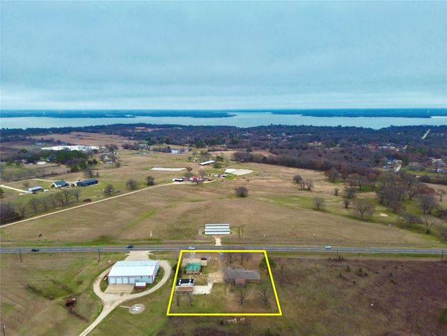 Birds eye view of property featuring a rural view and a water view | Image 7