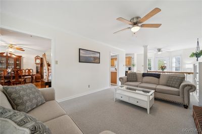 Living room with light colored carpet | Image 2