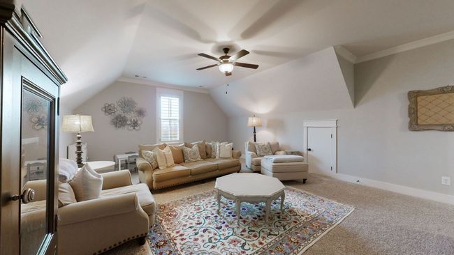 Endless possibilities await in this upstairs bonus room—perfect for a media space, playroom, or home gym. With large storage closets and cozy carpet, it’s ready for whatever fits your lifestyle. | Image 40