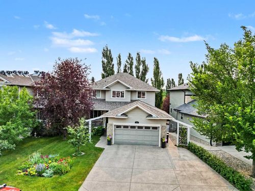 915 Coopers Dr Sw, House with 5 bedrooms, 4 bathrooms and 5 parking in Airdrie AB | Card Image