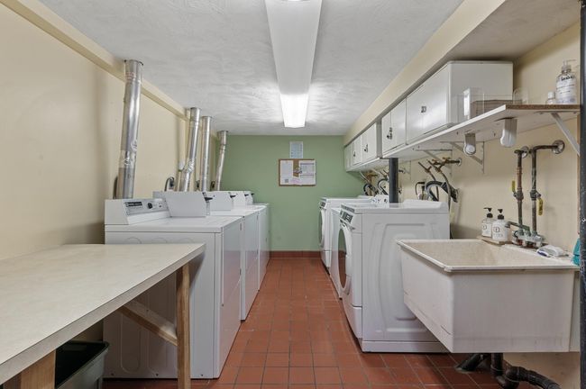 The laundry room (free to use) is right down the hall from the bedroom. | Image 40