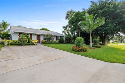 6195 Dimond Street, House other with 3 bedrooms, 2 bathrooms and null parking in Jupiter FL | Image 2