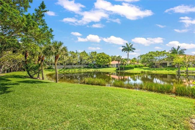 View of property's community with a water view and a yard | Image 24