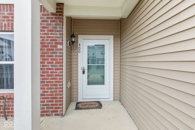 Covered Porch and Storm Door on the Front | Image 4