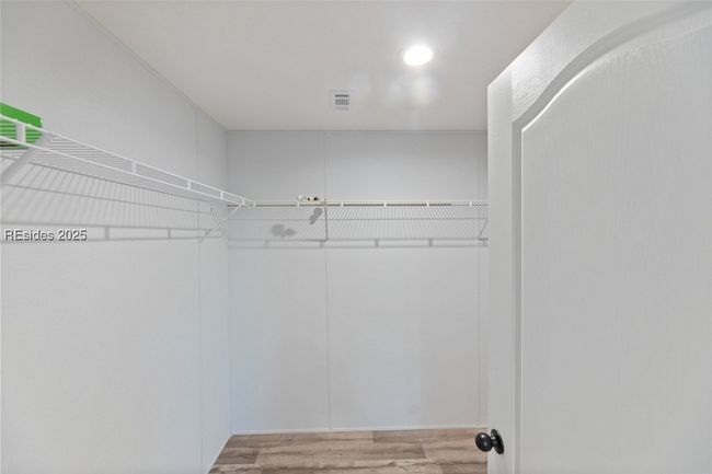 Primary closet. All photos are of similar model | Image 19