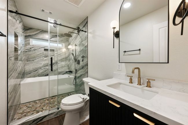 Wow! Jetted, deep tub, and a shower in a wet room. This bathroom was remodeled one year ago. | Image 26