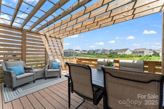 Your deck overlooking an open area maintained and mowed by the HOA | Image 36