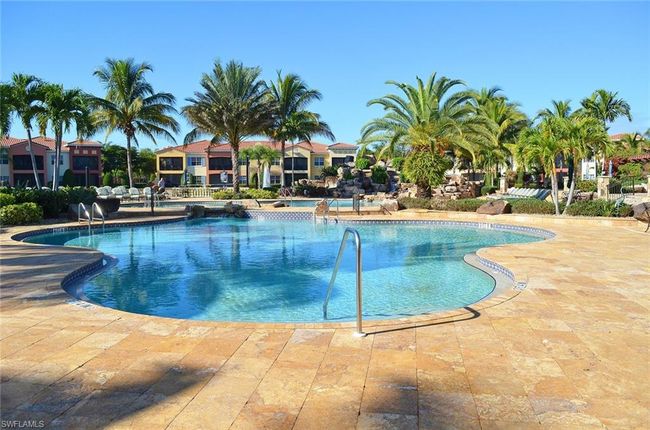 View of swimming pool featuring a patio area | Image 28