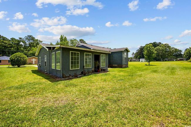 Rear view of house featuring a yard | Image 18