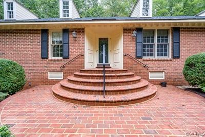 Brick exterior, classic entrance w/ brick walkway | Image 2