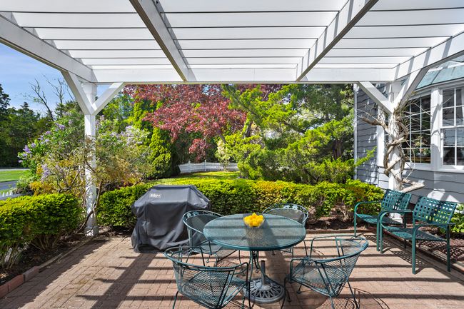 Stone patio &amp; pergola enhance outdoor living | Image 7